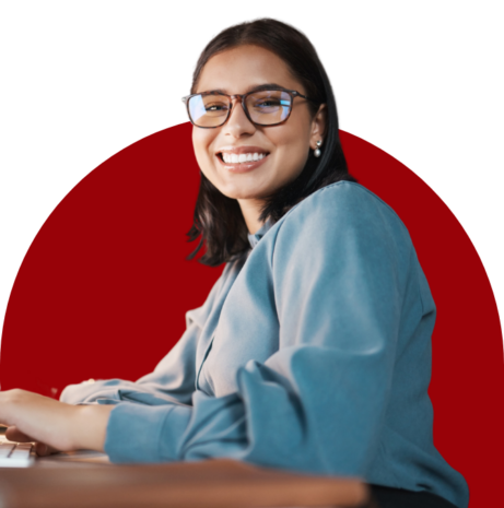 smiling woman at a keyboard