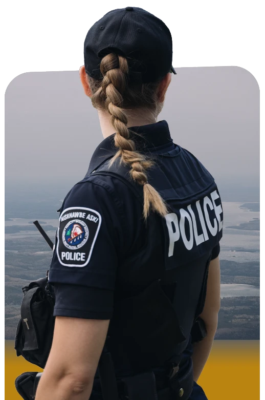 A police woman looks into the distance